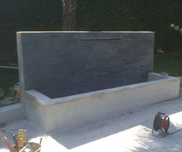 Construction d’un mur décoratif noir pour extérieur – NATB